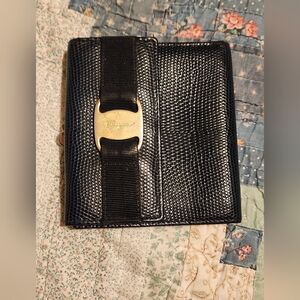 SOLD! Salvatore Ferragamo Black leather Tri-fold wallet.